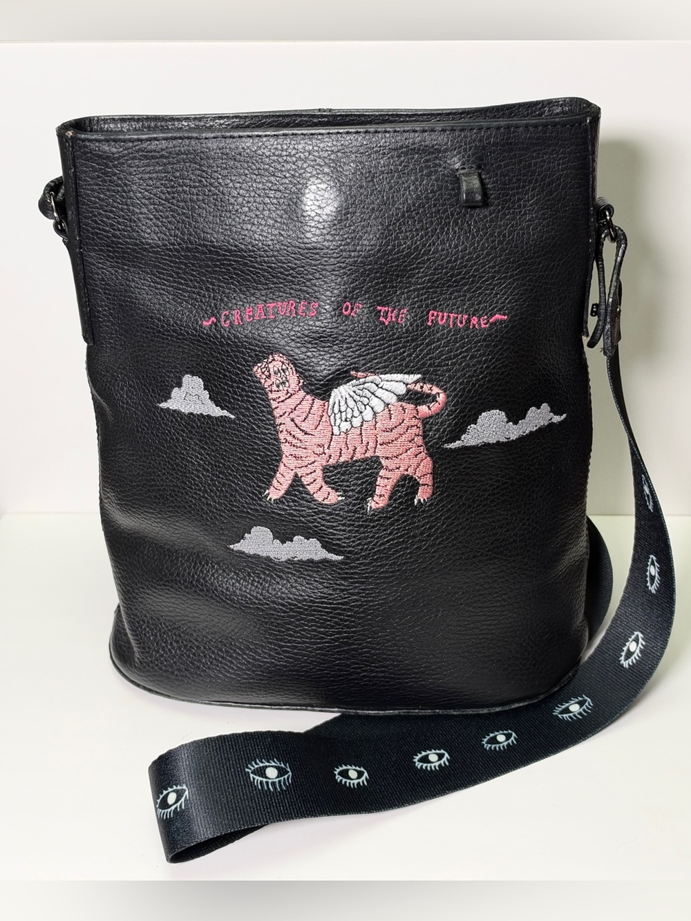 Min & Mon Creatures of the Future black leather Vincent bucket bag- winged tiger